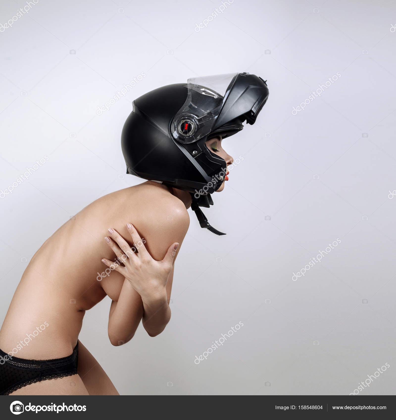 Black Biker Girls Naked - Naked girl in black motorcycle helmet Stock Photo by Â©Ishimaru 158548604