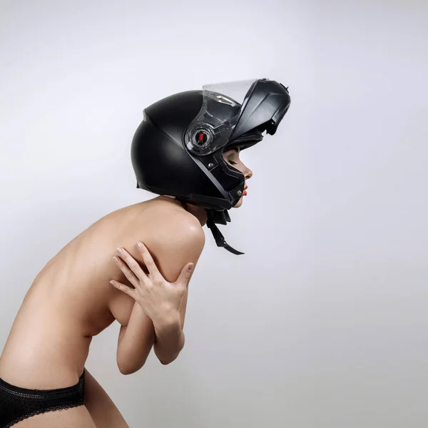 Naked girl in black motorcycle helmet — Stock Photo, Image