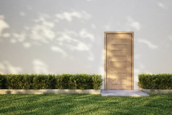 Белая Стена Кусте Деревянной Дверью Тень Дерева Траве — стоковое фото