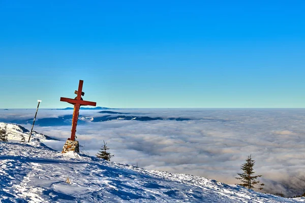 Amazing Landscape view from Ceahlau Mountains witn Sea of clouds in winter season, Aerial winter Landscape in National Park Ceahlau