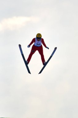 Rasnov, Romanya - 24-26 Ocak 2020: Shpyneva Anna kayak atlamacısı Romanya 'nın Rasnov kentinde düzenlenen Bayanlar Fis Dünya Kayak Şampiyonasını kazanmak için yarışıyor