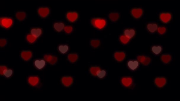 Animación Corazón Rojo Blanco Con Bokeh Sobre Fondo Negro — Vídeo de stock