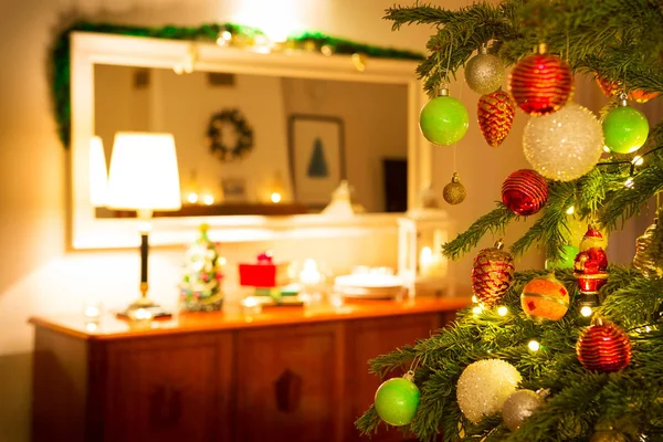 Christmas tree and family home interior with decorations