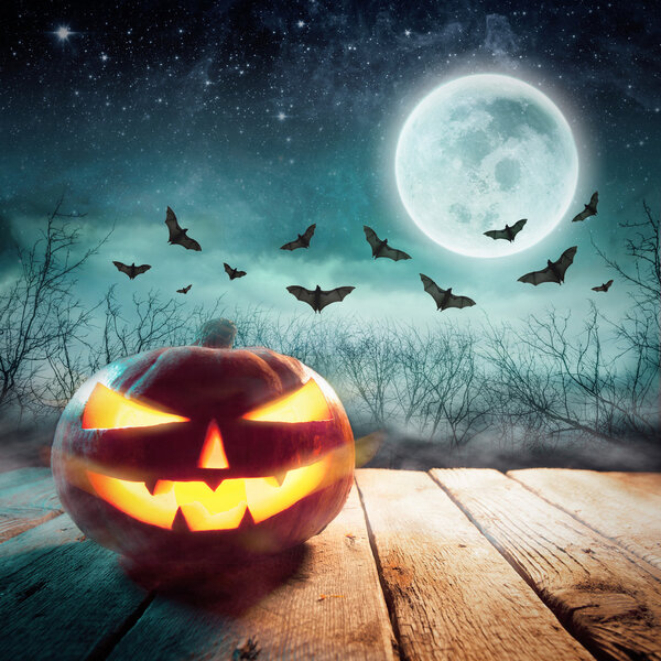 Glowing Jack in a dark mist Forest. Elements of this image furnished by NASA