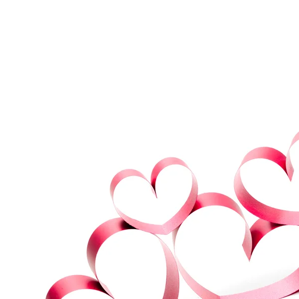 Ribbons shaped as hearts on white — Stock Photo, Image