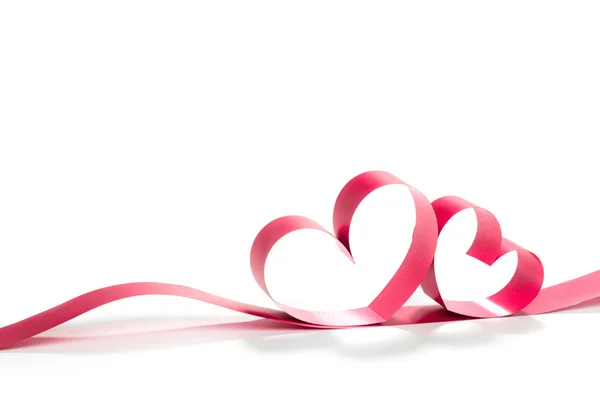 Ribbons shaped as hearts on white — Stock Photo, Image
