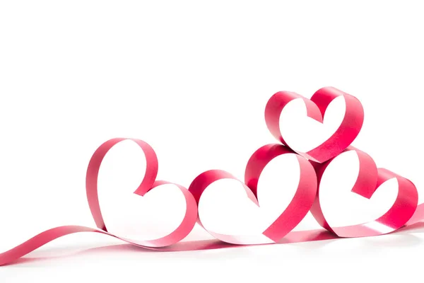 Ribbons shaped as hearts on white — Stock Photo, Image