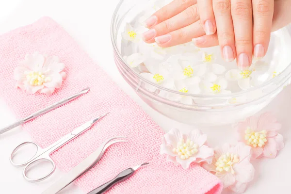 Beautiful woman hands with french manicure — Stock Photo, Image