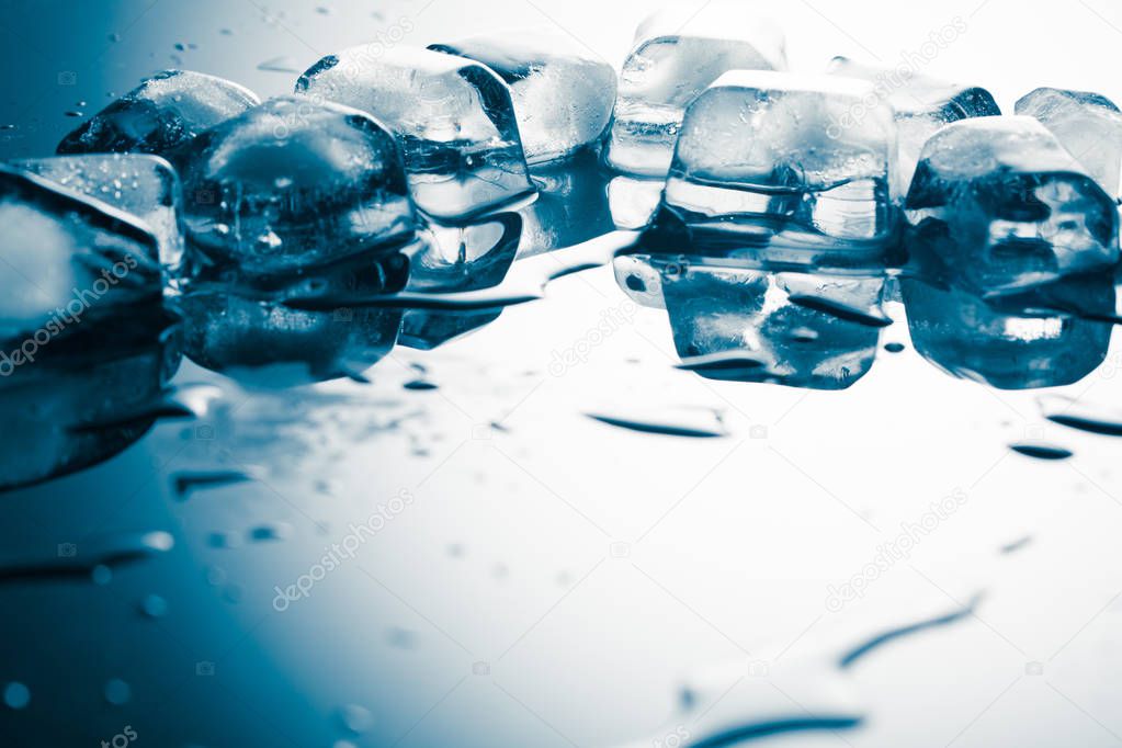 Ice cubes on table