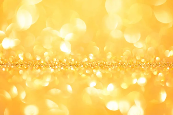 Abstract schijnt glitters gouden vakantie bokeh achtergrond — Stockfoto