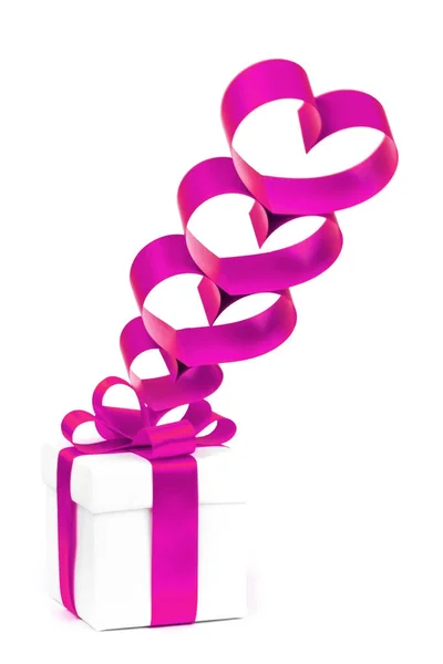 Holiday gift box with purple ribbon — Stock Photo, Image