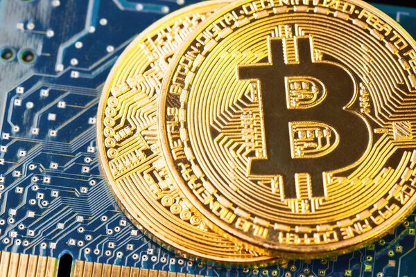 Golden Bitcoin Cryptocurrency на системной плате
.
