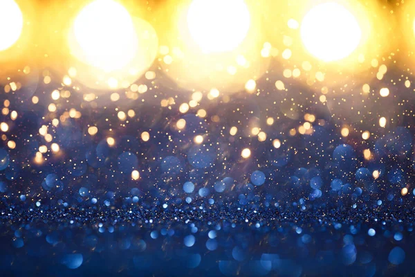 Рождественские винтажные огни фон. Золотые огни и голубые блёстки. defocused — стоковое фото