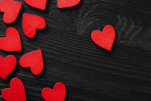 Happy Valentine's day hearts on wooden background. — Stock Photo, Image
