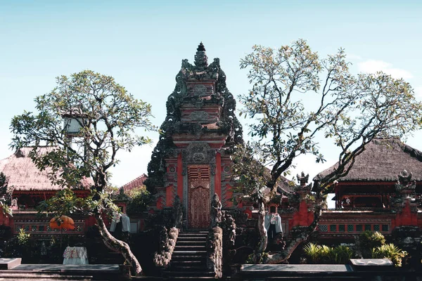 One of the temples among the trees on the island of Bali