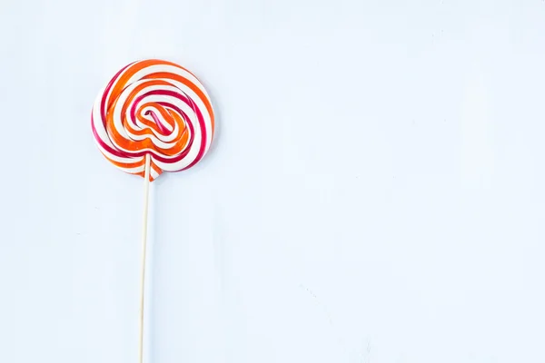 Lollipop godis på en vit bakgrund — Stockfoto