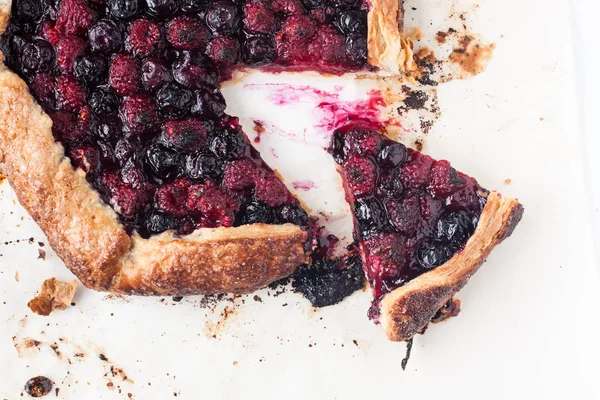Berry galette on parchment paper — Stock Photo, Image