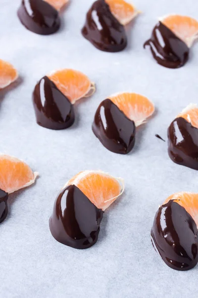 Tangerine Mandarijn vruchten met chocolade bedekt — Stockfoto