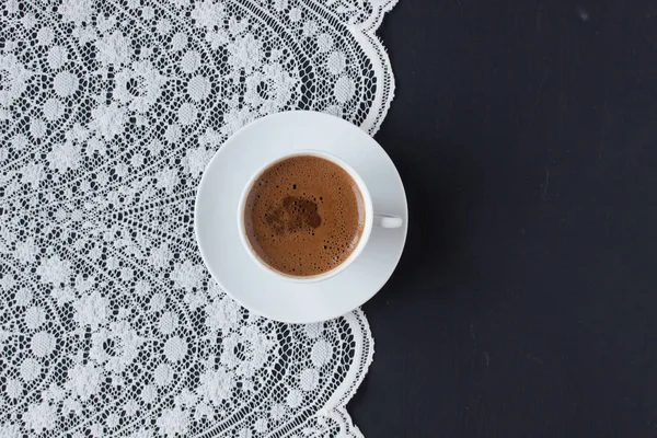 Turkish coffee on a lace and black background — Stock Photo, Image