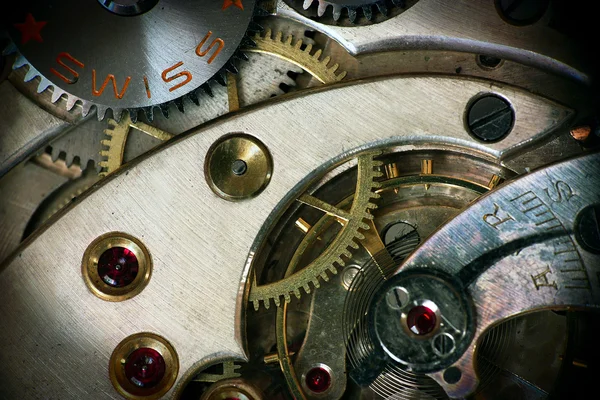 Old swiss made pocket watch inside with vignette — Stock Photo, Image