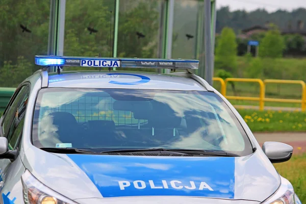 Nahaufnahme Auf Dem Schild Policja Polizei Auto Polen lizenzfreie Stockbilder