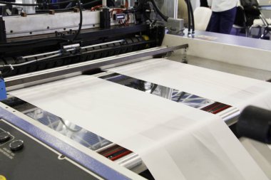 Plastik poşet üretimi için kullanılan bir makine parçası..