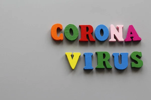 Written by CORONAVIRUS on a gray background. Quarantine all over the world. Coronavirus Prevention Pandemic of the 21st century. Epidemic prevention.