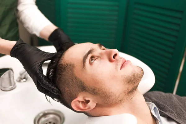 Hairdresser Washes Clients Hair Cutting Serious Handsome Man Washes His  Stock Photo by © 322086246