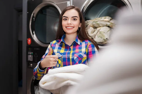 Girl Pleased Result Washing Woman Laundromat Showing Thumbs — 스톡 사진
