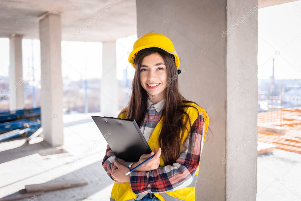 Young female engineer at a construction site