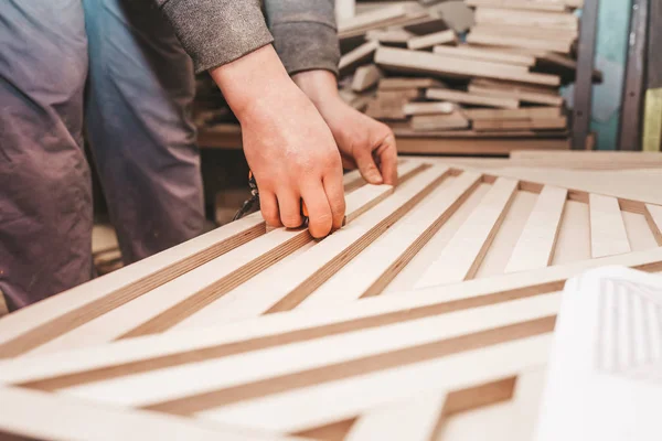 Carpenter Measures Plywood Boards — Stock Photo, Image