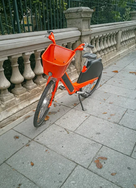 food delivery vehicles. Home delivery by bike in the city. Bicycle parking in the street
