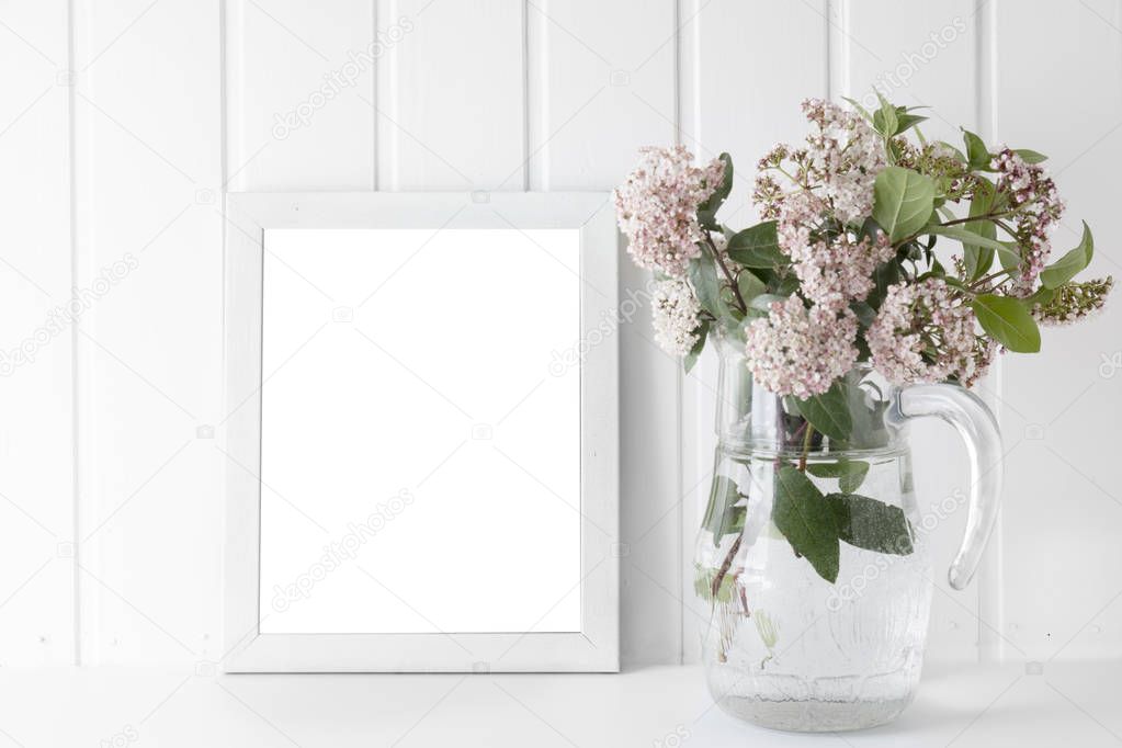 empty picture frame, decorated with Bouquet of pink natural flow