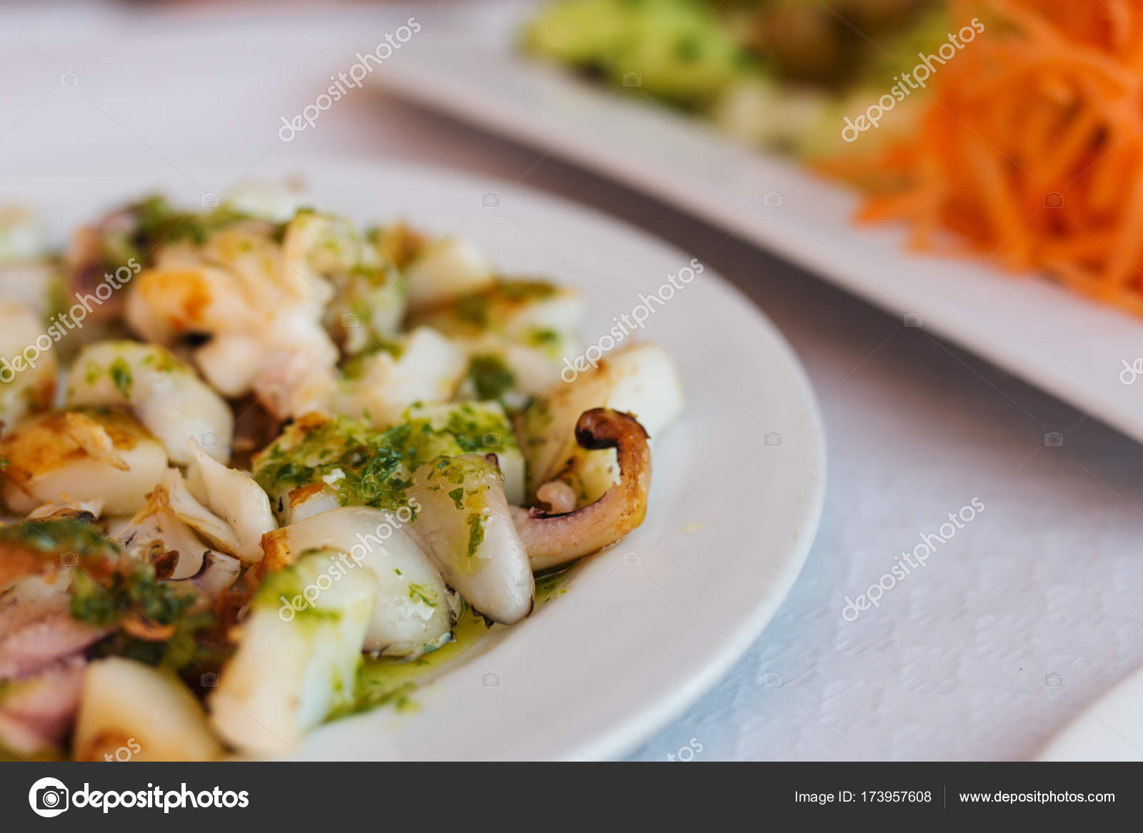 Octopus With Garlic Olive Oil And Parsley Typical Spanish Food Stock Photo C Saquizeta