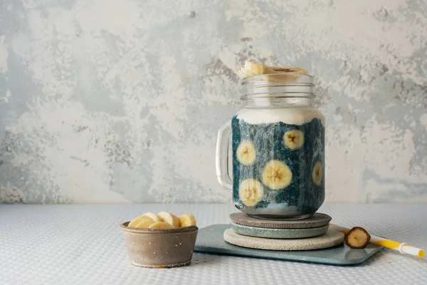 Chia smoothie, with fresh platanos and coconut and blueberries m — Stock Photo, Image
