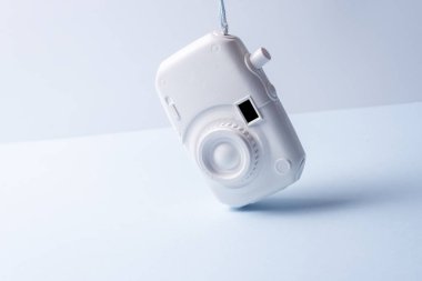 White camera. surrealism abstract concept. soft background