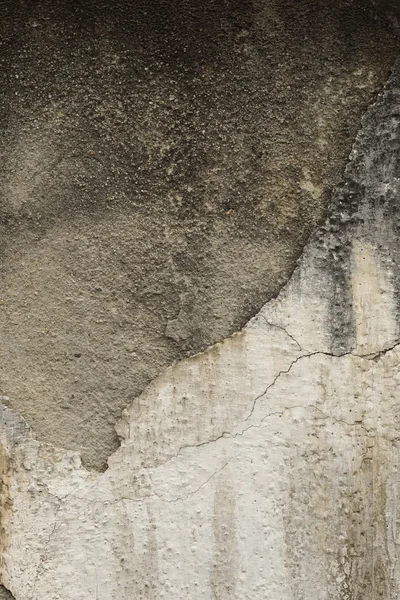 Grunge, áspero, pared de yeso viejo ronca con parte pintada — Foto de Stock