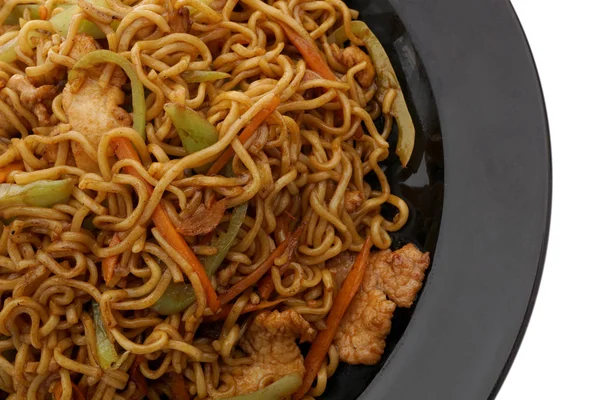 Çin yemeği. Domuz eti ve sebze ile erişte