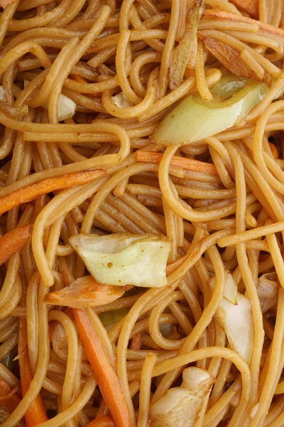 Comida chinesa. Espaguete com legumes — Fotografia de Stock