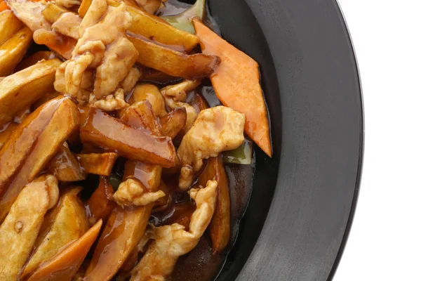 Chińskie jedzenie. Kurczak w sosie z ziemniakami i warzywami — Zdjęcie stockowe
