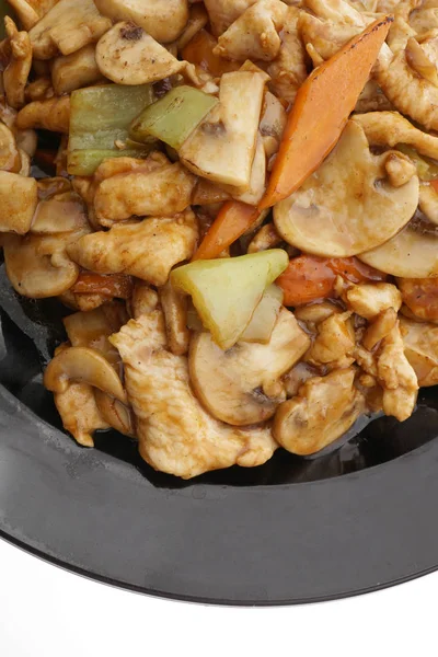 Chiński danie. Kurczak z pieczarkami i warzywami — Zdjęcie stockowe