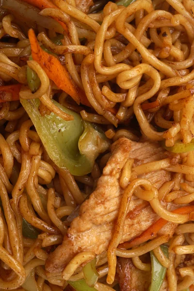 Kínai élelmiszer. Tészta sertés, zöldség — Stock Fotó