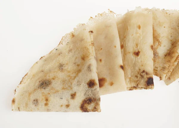 Nybakade rullade Blinier eller crepes isolerade — Stockfoto