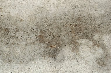 Yaşlı boyalı sıva kırık taş veya çakıl, kum ve çimento karışımı ile