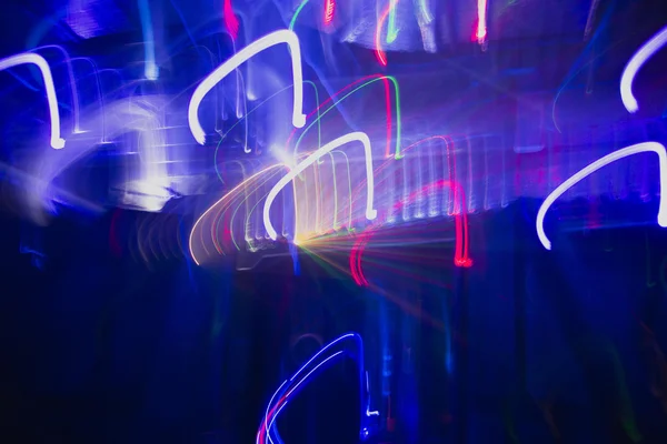 Лазерные фоновые лучи в игре, где все съемки — стоковое фото