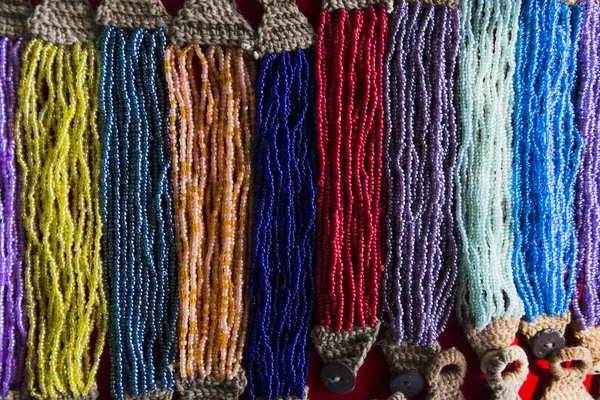 Beads bracelets background multicolored — Stock Photo, Image