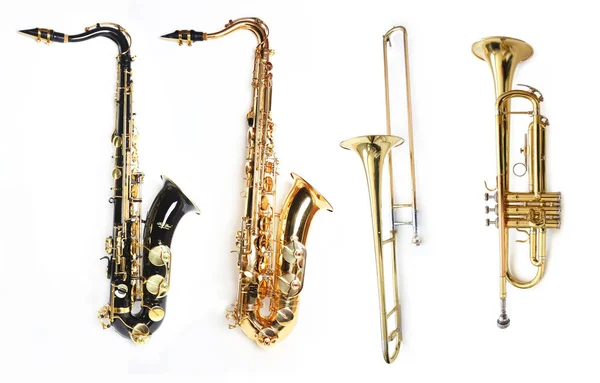 Zwart en goud Tenor saxofoon, Trombone en trompet — Stockfoto