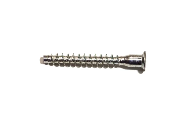 Screw bolt for furniture on white background, isolated. Furniture fittings concept.
