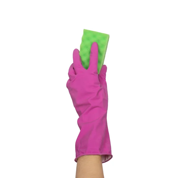Een hand in een handschoen houdt een spons vast voor het wassen en schoonmaken van de vaat — Stockfoto