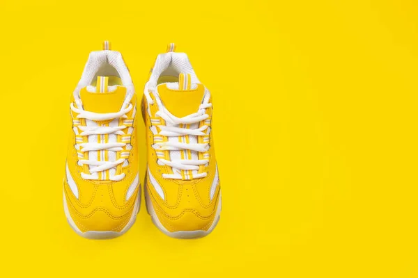 New Yellow Female Sneakers Yellow Background Monochrome Pop Art Concept — Stock Photo, Image
